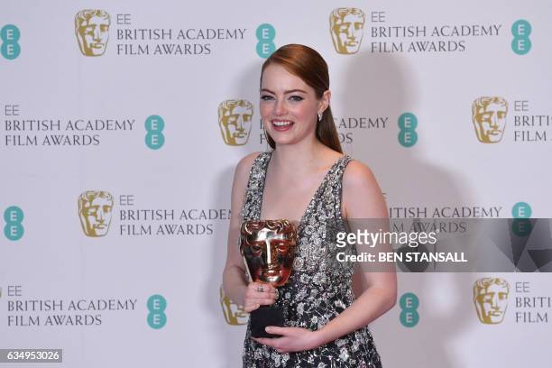 Actress Emma Stone poses with the award for a Leading Actress for her work on the film 'La La Land' at the BAFTA British Academy Film Awards at the...