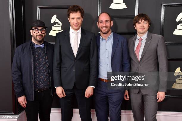 Recording artists Tim Nordwind, Damian Kulash, Dan Konopka, and Andy Ross of music group OK Go attend The 59th GRAMMY Awards at STAPLES Center on...