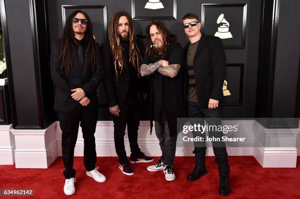 Musicians James Shaffer, Brian Welch, Reginald Arvizu and Ray Luzier of the music group Korn attend The 59th GRAMMY Awards at STAPLES Center on...