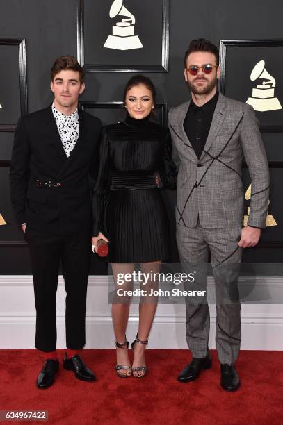 Recording artist Daya poses with recording artists Andrew Taggart and Alex Pall of music group The Chainsmokers during The 59th GRAMMY Awards at...