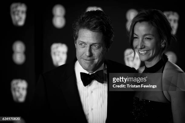 Hugh Grant and Anna Elisabet Eberstein attend the 70th EE British Academy Film Awards at Royal Albert Hall on February 12, 2017 in London, England.