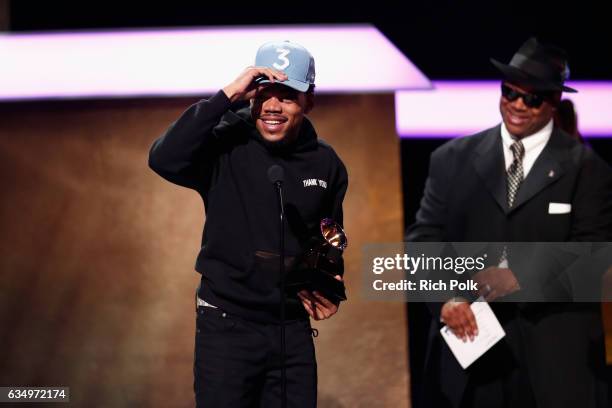 Hip-hop artist Chance the Rapper accepts the Best Rap Performance award for 'No Problem' from Recording Academy Chair Emeritus/musician Jimmy Jam...