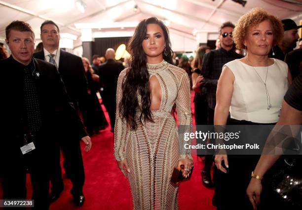 Singer Demi Lovato and CEO of BET Debra L. Lee attend The 59th GRAMMY Awards at STAPLES Center on February 12, 2017 in Los Angeles, California.