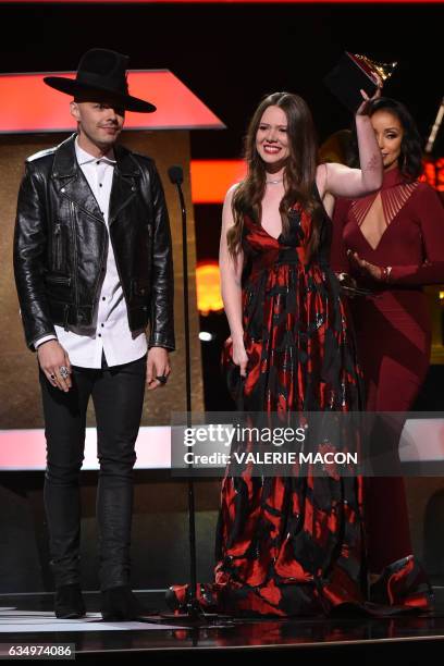 Jesse and Joy receives a Grammy for the best Latin Pop Album during the 59th Annual Grammy music Awards pre-telecast on February 12 in Los Angeles,...