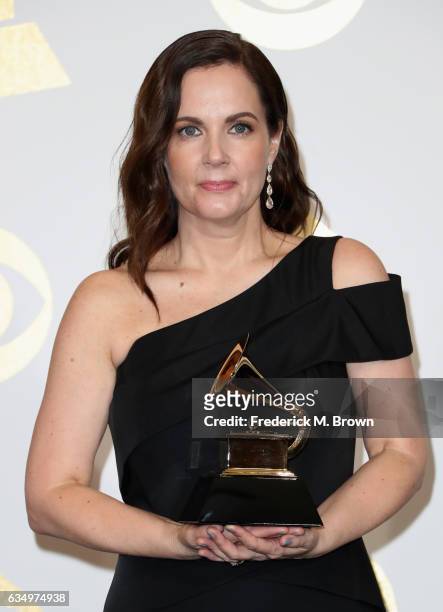 Songwriter Lori McKenna, winner of Best Country Song for, 'Humble and Kind,' poses in the press room during The 59th GRAMMY Awards at STAPLES Center...