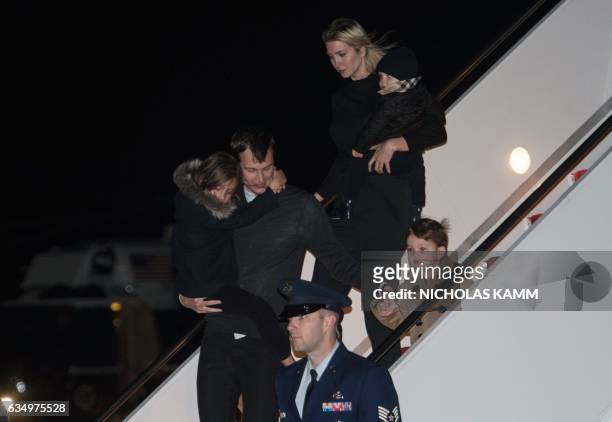 Ivanka Trump, daughter of US President Donald Trump, her husband Jared Kushner, senior White House adviser, and their children walk off Air Force One...