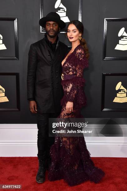 Recording artist Gary Clark Jr. And Nicole Trunfio attend The 59th GRAMMY Awards at STAPLES Center on February 12, 2017 in Los Angeles, California.