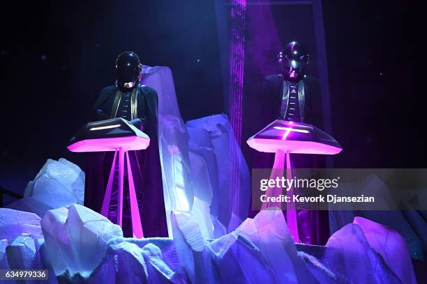 Recording artists Daft Punk perform onstage during The 59th GRAMMY Awards at STAPLES Center on February 12, 2017 in Los Angeles, California.