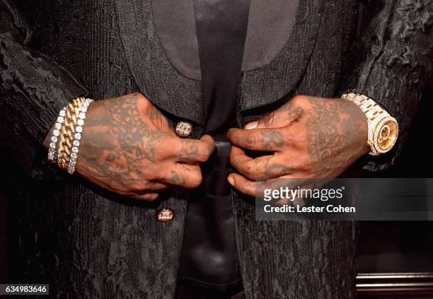 Rapper Rick Ros, fashion/jewelry detail, attends The 59th GRAMMY Awards at STAPLES Center on February 12, 2017 in Los Angeles, California.