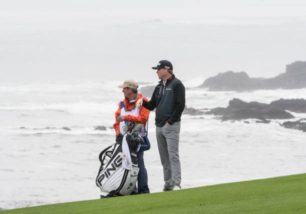 Trey Mullinax takes in the sights with his caddy during the second round of the AT&T Pebble Beach Pro-Am in Pebble Beach, CA on Friday, February 10,...