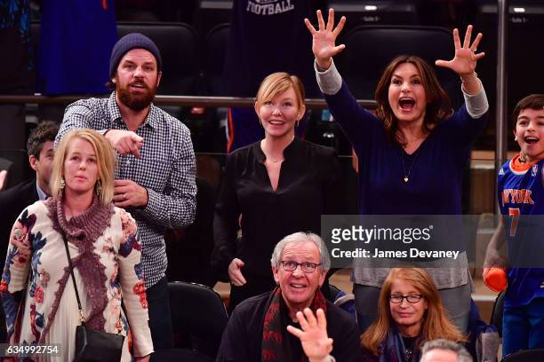 Lawrence Faulborn, Kelli Giddish and Mariska Hargitay attend the San Antonio Spurs Vs. New York Knicks game at Madison Square Garden on February 12,...