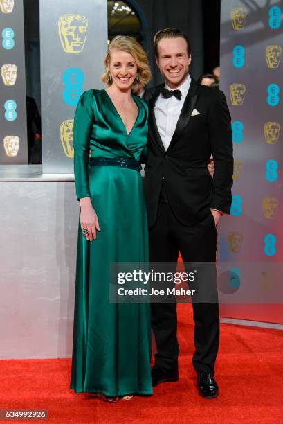 Elize Du Toit and Rafe Spall attend the 70th EE British Academy Film Awards at Royal Albert Hall on February 12, 2017 in London, England.