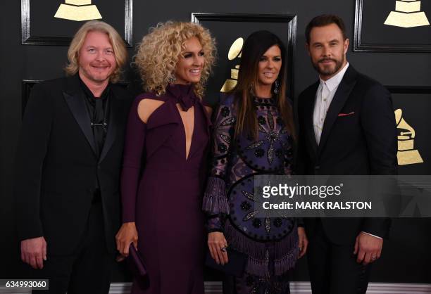 Recording artists Jimi Westbrook, Karen Fairchild, Kimberly Schlapman, and Philip Sweet of music group Little Big Town arrive for the 59th Grammy...