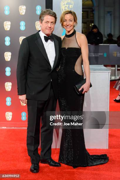 Hugh Grant and Anna Elisabet Eberstein attend the 70th EE British Academy Film Awards at Royal Albert Hall on February 12, 2017 in London, England.