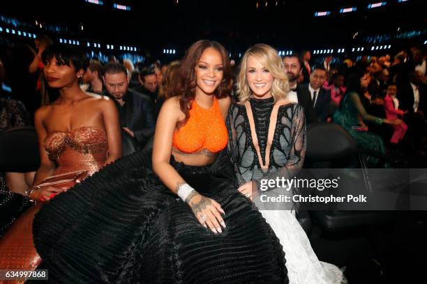 Recording artists Rihanna and Carrie Underwood during The 59th GRAMMY Awards at STAPLES Center on February 12, 2017 in Los Angeles, California.