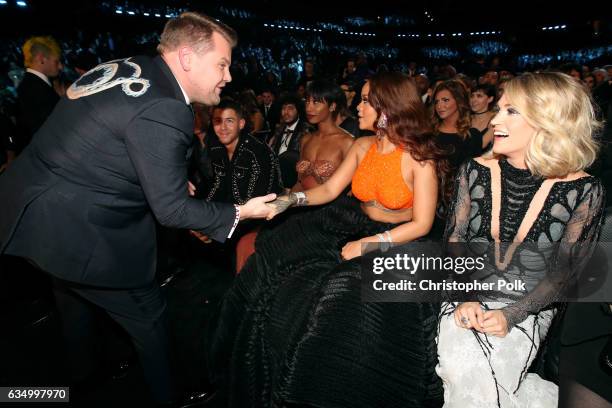 Host James Corden, recording artists Rihanna and Carrie Underwood during The 59th GRAMMY Awards at STAPLES Center on February 12, 2017 in Los...