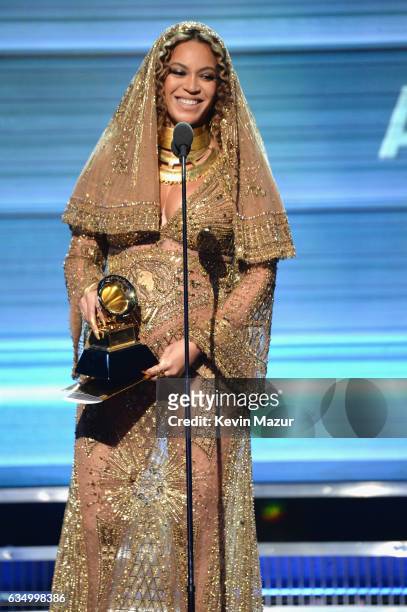 Beyonce accepts award onstage during The 59th GRAMMY Awards at STAPLES Center on February 12, 2017 in Los Angeles, California.