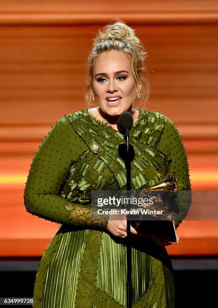Songwriter Adele Adkins accepts the Song Of The Year award for 'Hello' onstage during The 59th GRAMMY Awards at STAPLES Center on February 12, 2017...