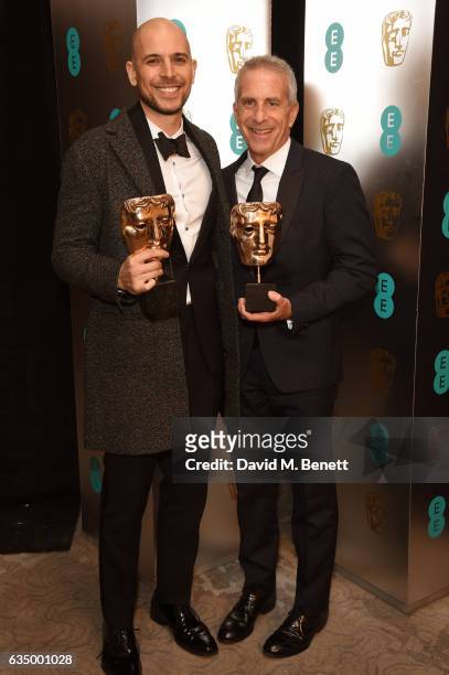 Fred Berger and Marc Platt attend the official After Party Dinner for the EE British Academy Film Awards at Grosvenor House on February 12, 2017 in...