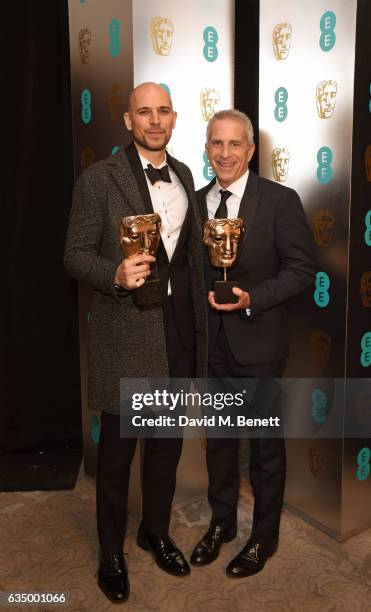 Fred Berger and Marc Platt attend the official After Party Dinner for the EE British Academy Film Awards at Grosvenor House on February 12, 2017 in...