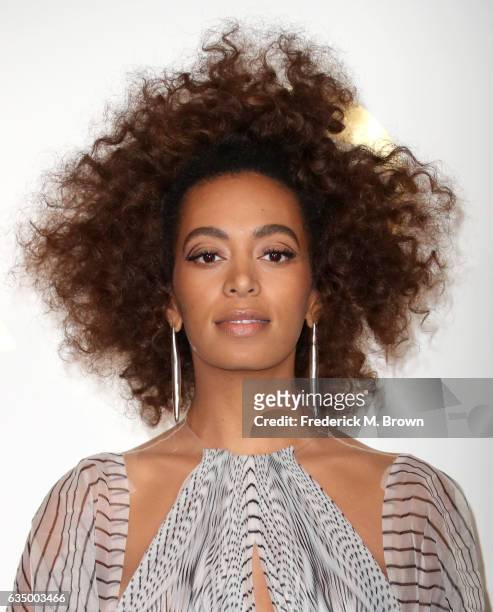 Singer Solange Knowles, winner of Best R&B Performance for 'Cranes in the Sky,' poses in the press room during The 59th GRAMMY Awards at STAPLES...