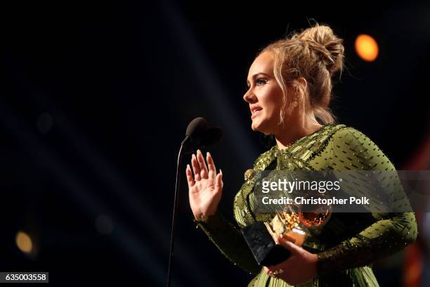 Singer Adele accepts the award for Song of The Year for "Hello" during The 59th GRAMMY Awards at STAPLES Center on February 12, 2017 in Los Angeles,...