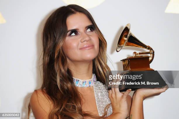 Singer/songwriter Maren Morris, winner of Best Country Solo Performance for 'My Church,' poses in the press room during The 59th GRAMMY Awards at...