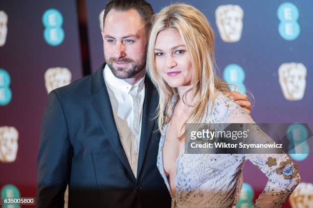 Preston J. Cook and Julia Stiles attend the 70th British Academy Film Awards ceremony at the Royal Albert Hall on February 12, 2017 in London,...