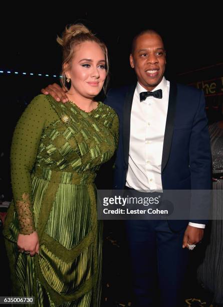 Recording artists Adele and Jay Z during The 59th GRAMMY Awards at STAPLES Center on February 12, 2017 in Los Angeles, California.