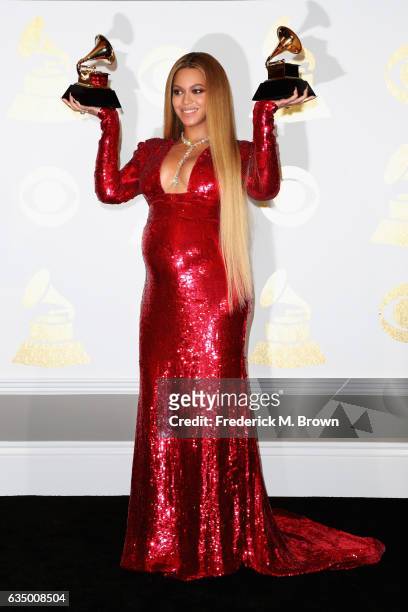 Singer Beyonce, winner of Best Urban Contemporary Album for 'Lemonade' and Best Music Video for 'Formation,' poses in the press room during The 59th...