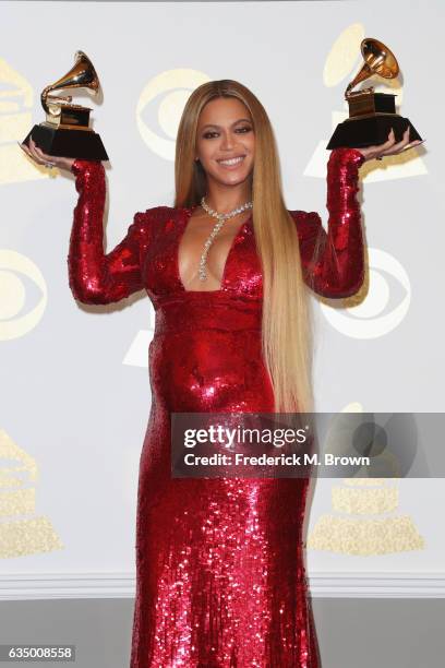 Singer Beyonce, winner of Best Urban Contemporary Album for 'Lemonade' and Best Music Video for 'Formation,' poses in the press room during The 59th...