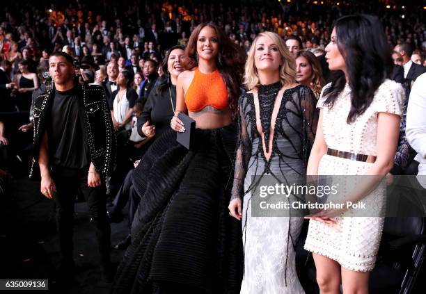 Singer/Actor Nick Jonas, singer Rihanna, singer Carrie Underwood and Guest during The 59th GRAMMY Awards at STAPLES Center on February 12, 2017 in...
