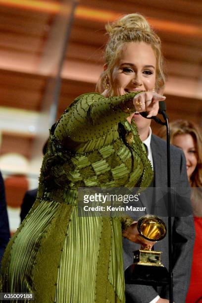 Adele accepts award onstage during The 59th GRAMMY Awards at STAPLES Center on February 12, 2017 in Los Angeles, California.