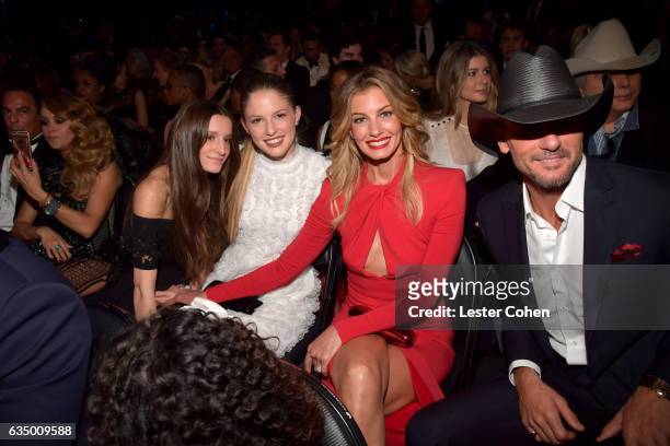 Singers Faith Hill and Tim McGraw with daughters Audrey McGraw and Maggie McGraw attend The 59th GRAMMY Awards at STAPLES Center on February 12, 2017...