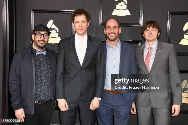 Recording artists Tim Nordwind, Damian Kulash, Dan Konopka, and Andy Ross of music group OK Go attend The 59th GRAMMY Awards at STAPLES Center on...