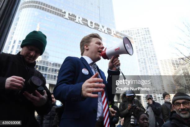 Activists gather across from Trump Tower before pulling down their pants and mooning on February 12, 2017 in Chicago, Illinois. The event was staged...