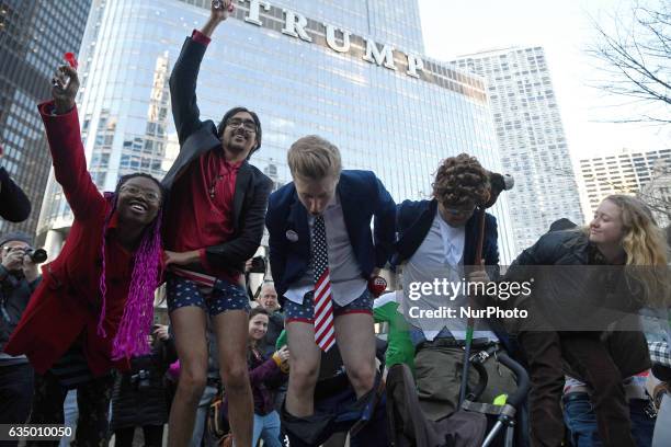 Activists gather across from Trump Tower before pulling down their pants and mooning on February 12, 2017 in Chicago, Illinois. The event was staged...