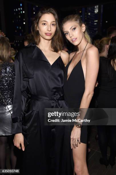 Models Alexandra Agoston and Devon Windsor attend Maybelline NYFW Welcome Party at PHD Terrace at Dream Midtown on February 12, 2017 in New York City.