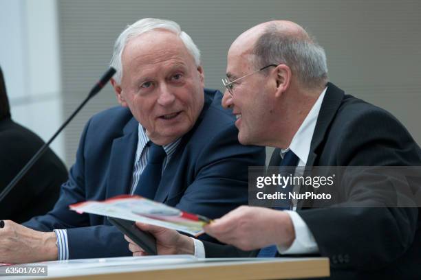 Politicians of the left party Die Linke Gregor Gysi and Oskar Lafontaine chat during a faction meeting prior to the vote for the election of the new...