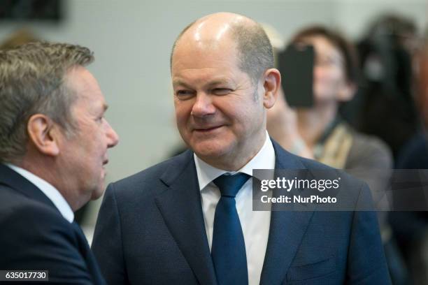 Hamburg's Mayor Olaf Scholz is pictured as she arrives to a meeting of the SPD faction before the vote for the election of the new President by the...