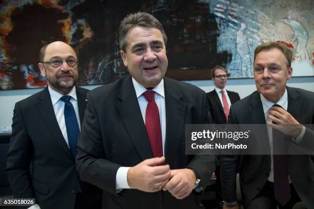 Chancellor candidate Martin Schulz , German Foreign Minister Sigmar Gabriel and chairman of the Bundestag SPD faction Thomas Hoppermann are pictured...