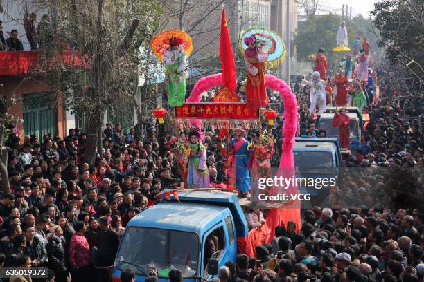 Aerial view of villagers crowding to watch Shehuo parades at Feng Village on February 12, 2017 in Xi An, Shaanxi Province of China. "Shehuo"...