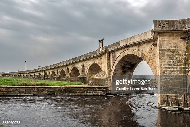 uzunkopru historical stone bridge in edirne - arch bridge stock pictures, royalty-free photos & images