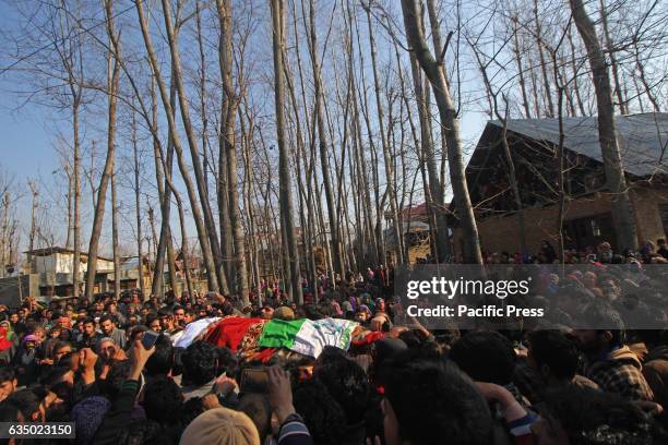 Kashmiris carry body of slain rebel, Mudasir Ahmed, in Redwani Kulgam south of Kashmir. Indian controlled Kashmir .Hundreds of mourners attended the...