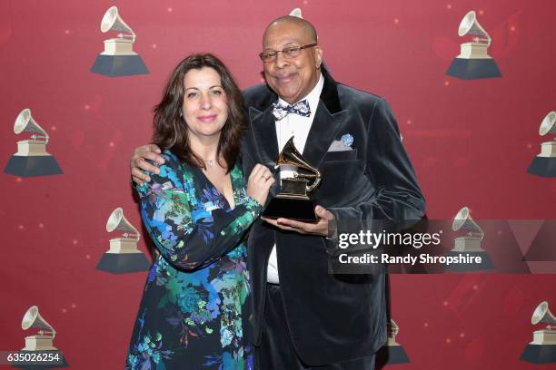 Musician Chucho Valdes poses with the award for Best Latin Jazz Album backstage at the Premiere Ceremony during the 59th GRAMMY Awards at Microsoft...