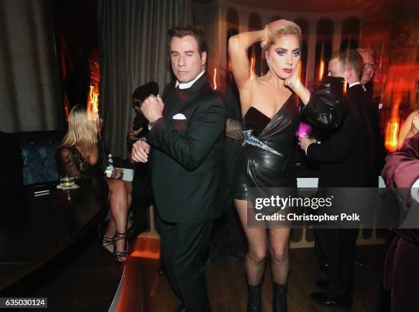 Actor John Travolta and recording artist Lady Gaga attend Interscope's Grammy After Party with Lady Gaga at the Peppermint Club on February 12, 2017...