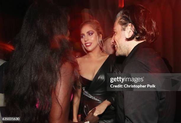 Recording artist Lady Gaga and Christian Carino attend Interscope's Grammy After Party with Lady Gaga at the Peppermint Club on February 12, 2017 in...