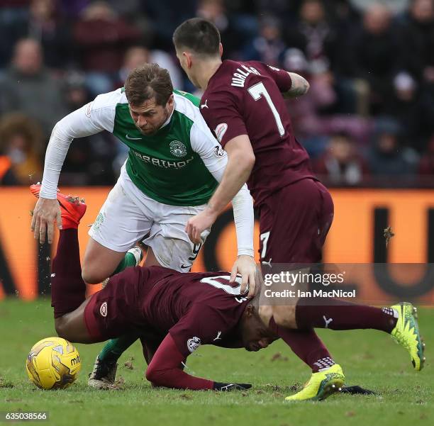 Esmael Goncalves of Heart of Middlothian vies with Grant Holt of Hibernian during the Scottish Cup Fifth Round match between Heart of Midlothian and...