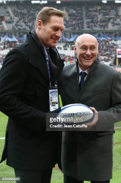 Ali Williams working for the BBC and President of French Rugby Federation Bernard Laporte who promotes the French candidacy to organize the Rugby...