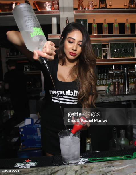 Bartender serves a drink at a celebration of music with Republic Records, in partnership with Absolut and Pryma, at Catch LA on February 12, 2017 in...